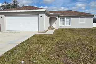 411 NE Juanita Pl, Cape Coral, FL 33909 - Photo 1