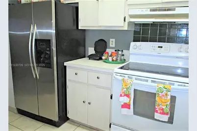 2451 NW 41st Ave #302, Lauderhill, FL 33313 - Photo 1