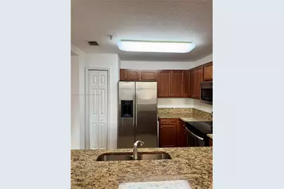 11401 NW 89th St #205, Doral, FL 33178 - Photo 5