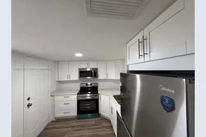 1301 NE 191st St #F407, Miami, FL 33179 - Photo 7