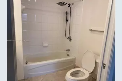 8060 N Nob Hill Rd #102, Tamarac, FL 33321 - Photo 13