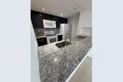 7075 NW 186th St #C409, Hialeah, FL 33015 - Photo 1