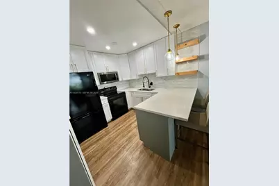 1750 W 56th St #211, Hialeah, FL 33012 - Photo 3