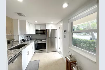 2671 S Course Dr #109, Pompano Beach, FL 33069 - Photo 3