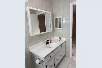 5061 W Oakland Park Blvd #211, Lauderdale Lakes, FL 33313 - Photo 17