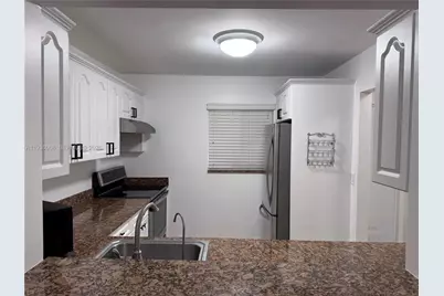 7703 Camino Real #A-307, Miami, FL 33143 - Photo 13