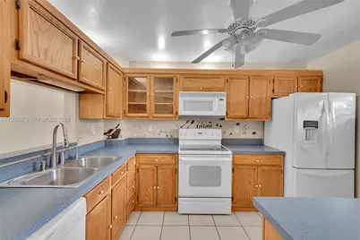 1100 NW 87th Ave #306, Coral Springs, FL 33071 - Photo 5