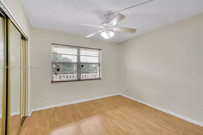 1100 NW 87th Ave #306, Coral Springs, FL 33071 - Photo 13