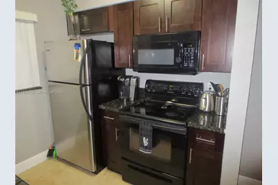 2811 N Oakland Forest Dr #106, Oakland Park, FL 33309 - Photo 1