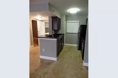 2811 N Oakland Forest Dr #106, Oakland Park, FL 33309 - Photo 5