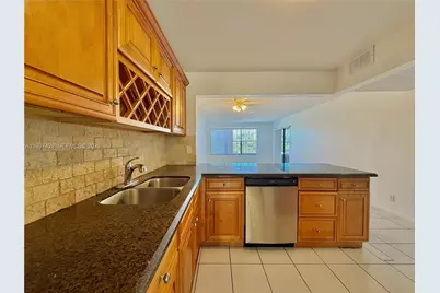 2320 S Cypress Bend Dr #305, Pompano Beach, FL 33069 - Photo 7