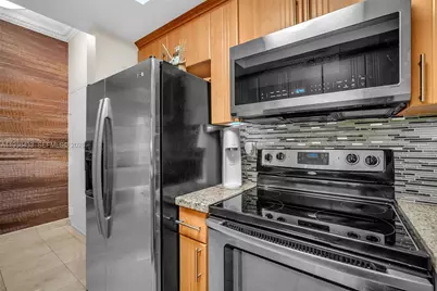 9725 NW 52nd St #115, Doral, FL 33178 - Photo 15