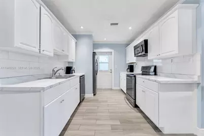 660 NE 59th Ct, Oakland Park, FL 33334 - Photo 1