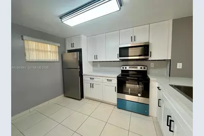 1100 NW 87th Ave #403, Coral Springs, FL 33071 - Photo 3