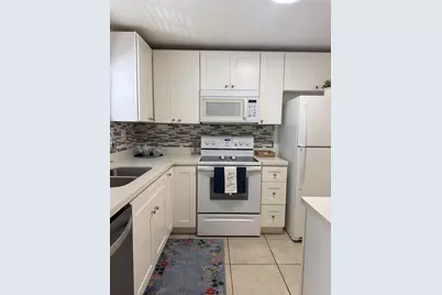 9540 Sunrise Lakes Blvd #208, Sunrise, FL 33322 - Photo 1