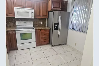 8592 W Sunrise Blvd #209, Plantation, FL 33322 - Photo 3