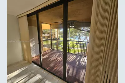 8592 W Sunrise Blvd #209, Plantation, FL 33322 - Photo 1