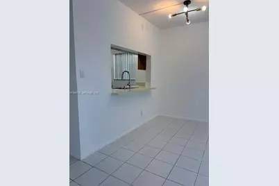 10057 Winding Lake Rd #102, Sunrise, FL 33351 - Photo 15