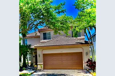 1587 Winterberry Ln, Weston, FL 33327 - Photo 1