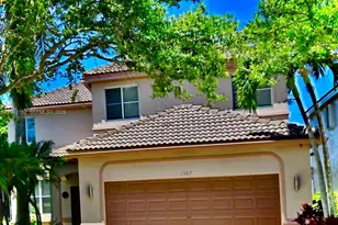 1587 Winterberry Ln, Weston, FL 33327 - Photo 1