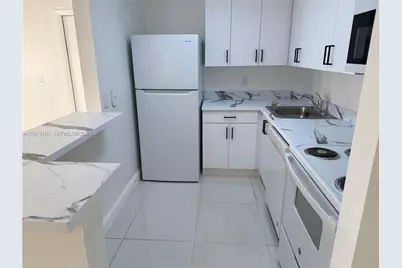 10773 Cleary Blvd #104, Plantation, FL 33324 - Photo 1