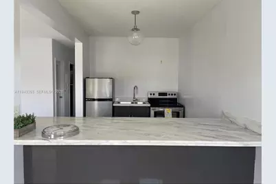 455 Golden Isles Dr #107, Hallandale Beach, FL 33009 - Photo 3