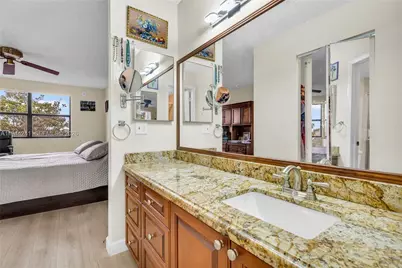 2981 N Nob Hill Rd #406, Sunrise, FL 33322 - Photo 11