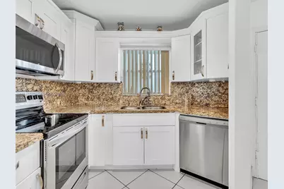 1750 W 46th St #404, Hialeah, FL 33012 - Photo 7