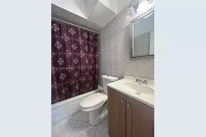 121 Golden Isles Dr #104, Hallandale Beach, FL 33009 - Photo 11