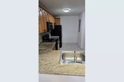 871 NE 207th Ln #103-15, Miami, FL 33179 - Photo 7