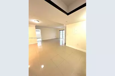 919 NE 199th St #104, Miami, FL 33179 - Photo 1
