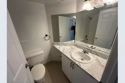 2881 N Oakland Forest Dr #202, Oakland Park, FL 33309 - Photo 11