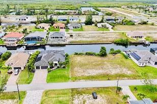 718 NW 38th Pl, Cape Coral, FL 33993 - Photo 1