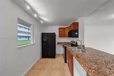 2800 NW 56th Ave #H104, Lauderhill, FL 33313 - Photo 5