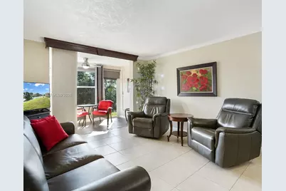 2751 N Pine Island Rd #105, Sunrise, FL 33322 - Photo 1