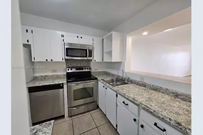 441 NE 195th St #105, Miami, FL 33179 - Photo 1