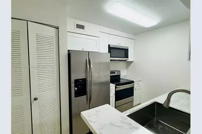 2851 N Oakland Forest Dr #110, Oakland Park, FL 33309 - Photo 3