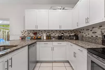 582 NE 207th St, Miami, FL 33179 - Photo 13