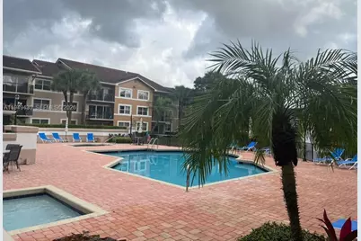 8701 Wiles Rd #103, Coral Springs, FL 33067 - Photo 7