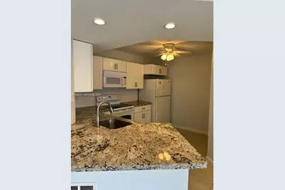 8701 Wiles Rd #103, Coral Springs, FL 33067 - Photo 1