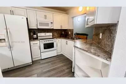 9156 NW 40th St #105-1, Coral Springs, FL 33065 - Photo 7