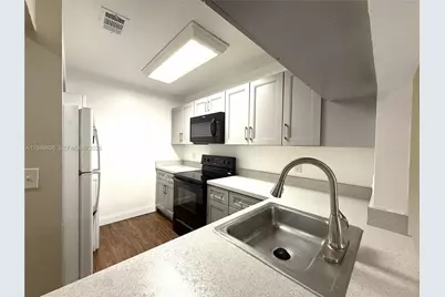 10043 Winding Lake Rd #201, Sunrise, FL 33351 - Photo 1