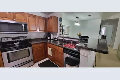 11295 W Atlantic Blvd #303, Coral Springs, FL 33071 - Photo 7