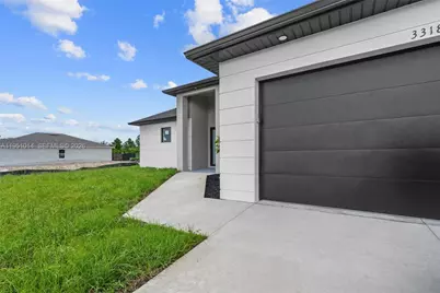 3318 30th St SW, Lehigh Acres, FL 33976 - Photo 5