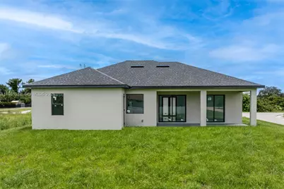 3318 30th St SW, Lehigh Acres, FL 33976 - Photo 35