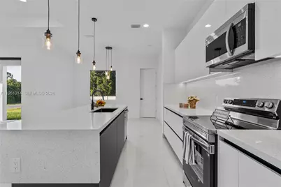 3318 30th St SW, Lehigh Acres, FL 33976 - Photo 13