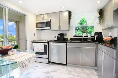 6570 Royal Palm Blvd #301J, Margate, FL 33063 - Photo 11