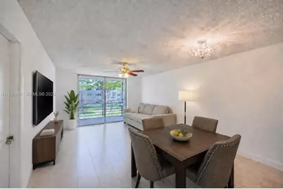 9100 Lime Bay Blvd #209, Tamarac, FL 33321 - Photo 1