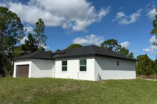 1121 Florence St E, Lehigh Acres, FL 33974 - Photo 3