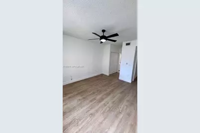 7930 N Nob Hill Rd #106, Tamarac, FL 33321 - Photo 5